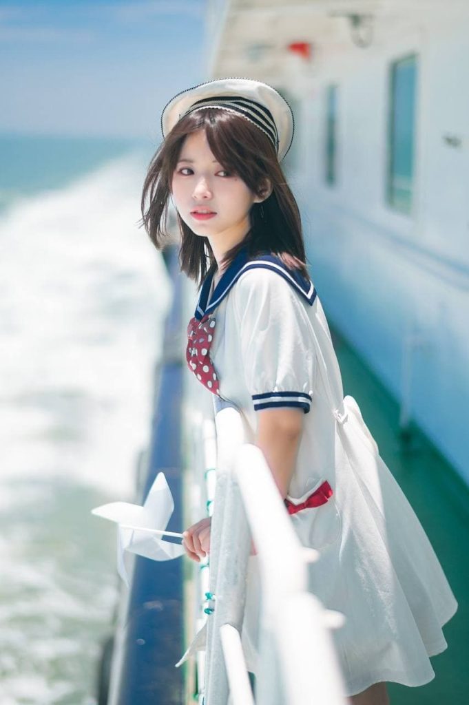 A serene photo of an enchanting Asian woman