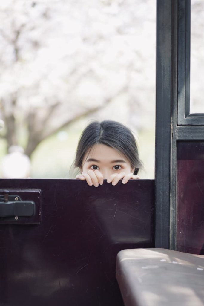 Beautiful Asian beauty in a serene landscape