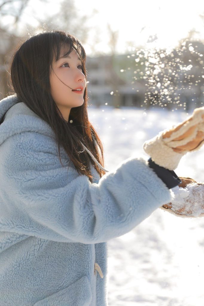 Beautiful Asian woman in a stylish outfit