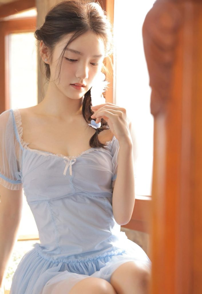 Captivating image of an Asian lady in soft light