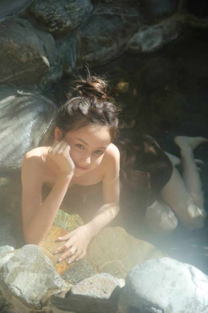 Elegant Asian woman framed by natural light