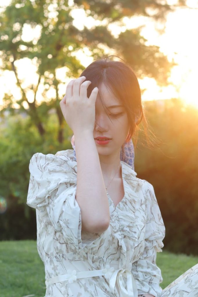 Elegant Asian woman posing in modern fashion