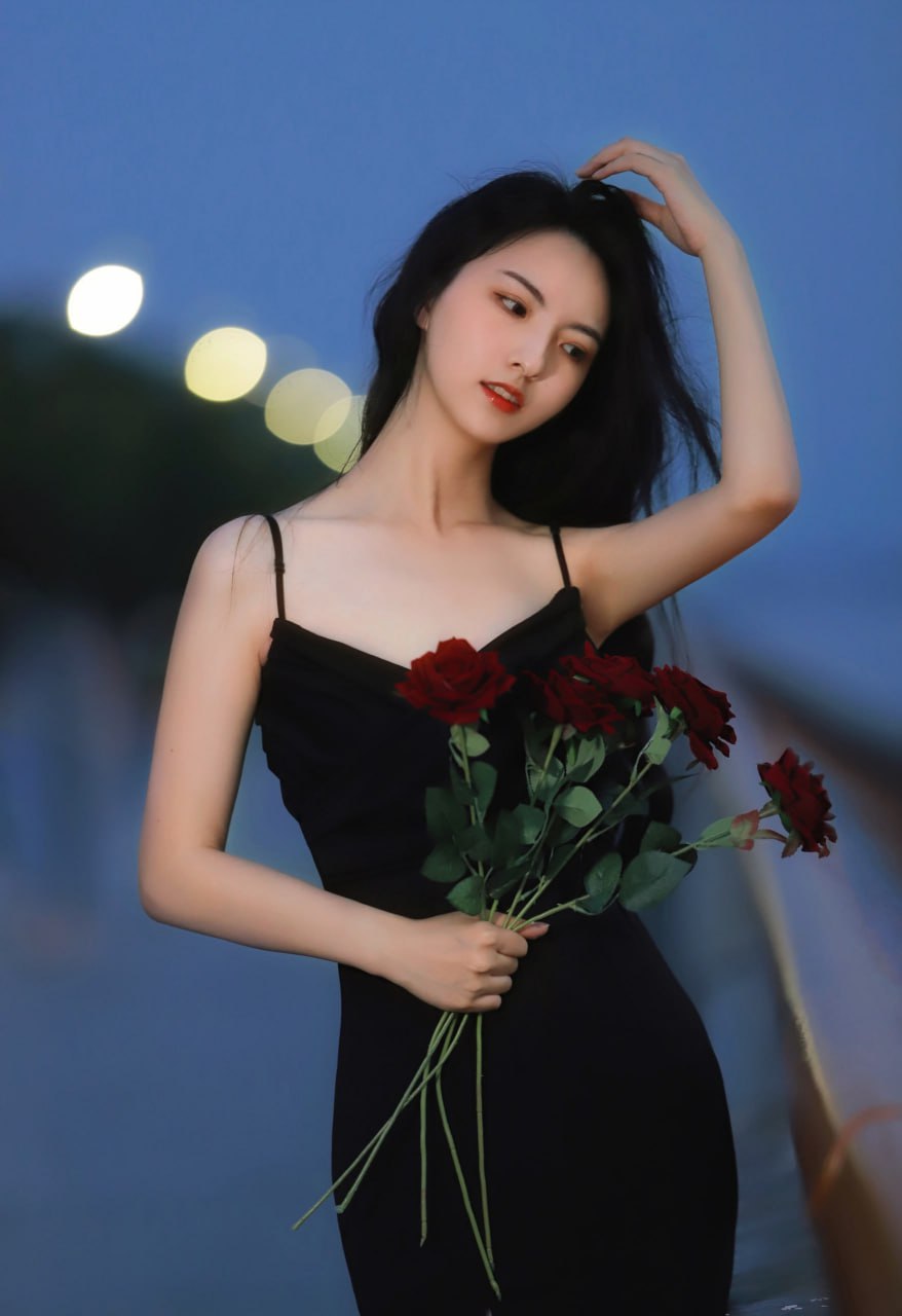 Elegant portrait of an Asian woman in nature