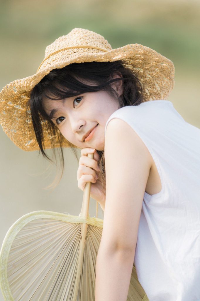 Elegant portrait of an Asian woman in nature