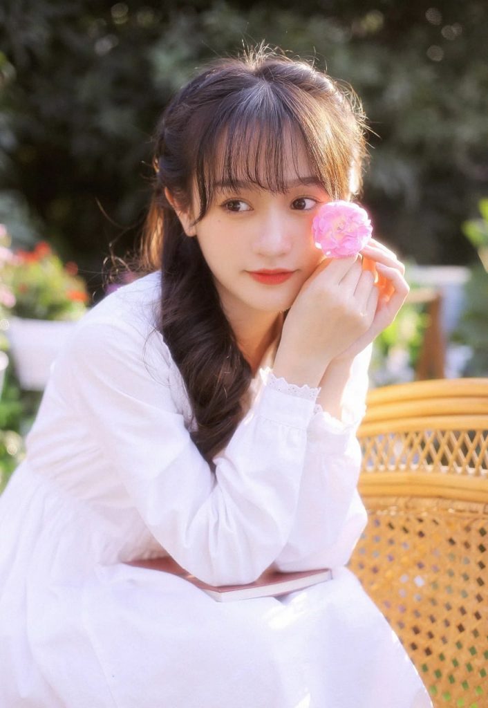 Radiant Asian woman in colorful attire