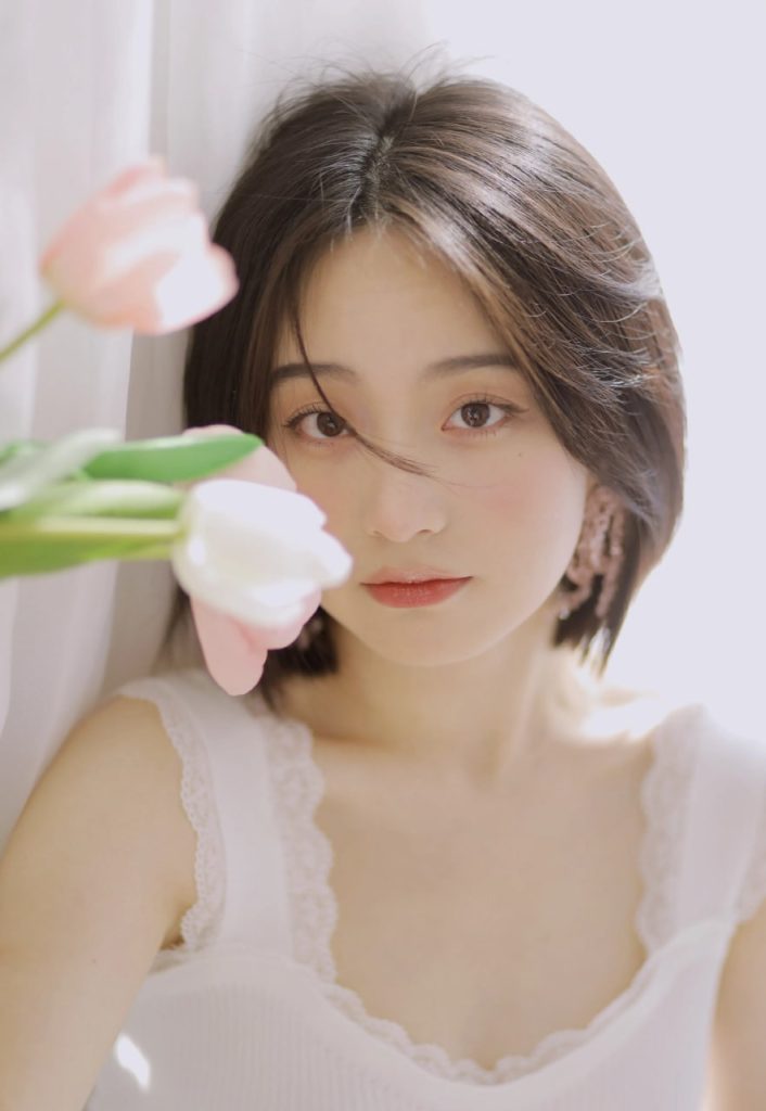 Radiant photo of a stylish young lady