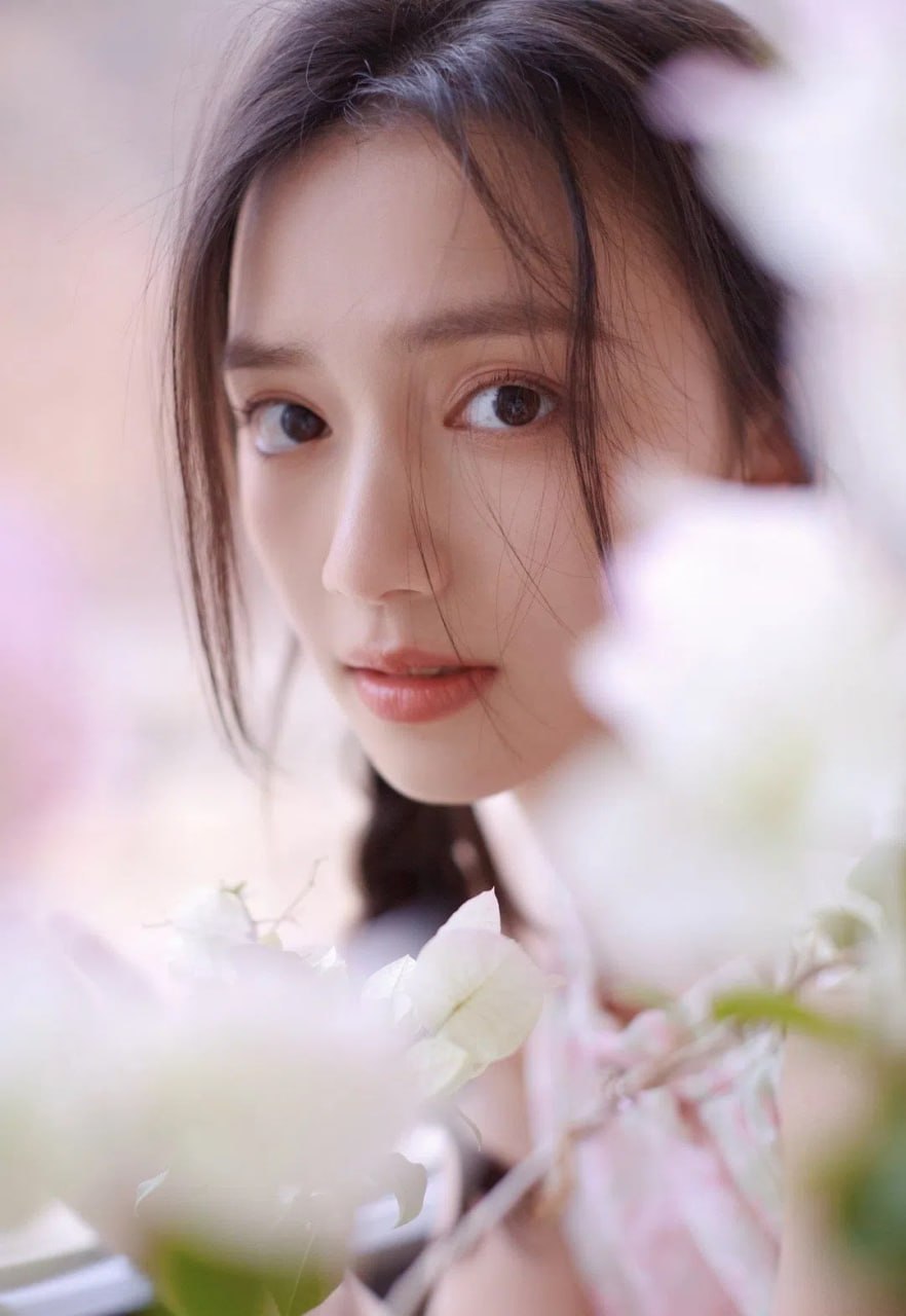 Radiant young Asian lady in a natural setting