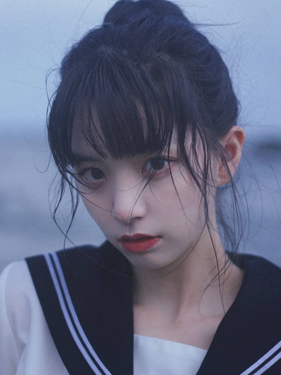 Stunning young Asian girl in a serene pose