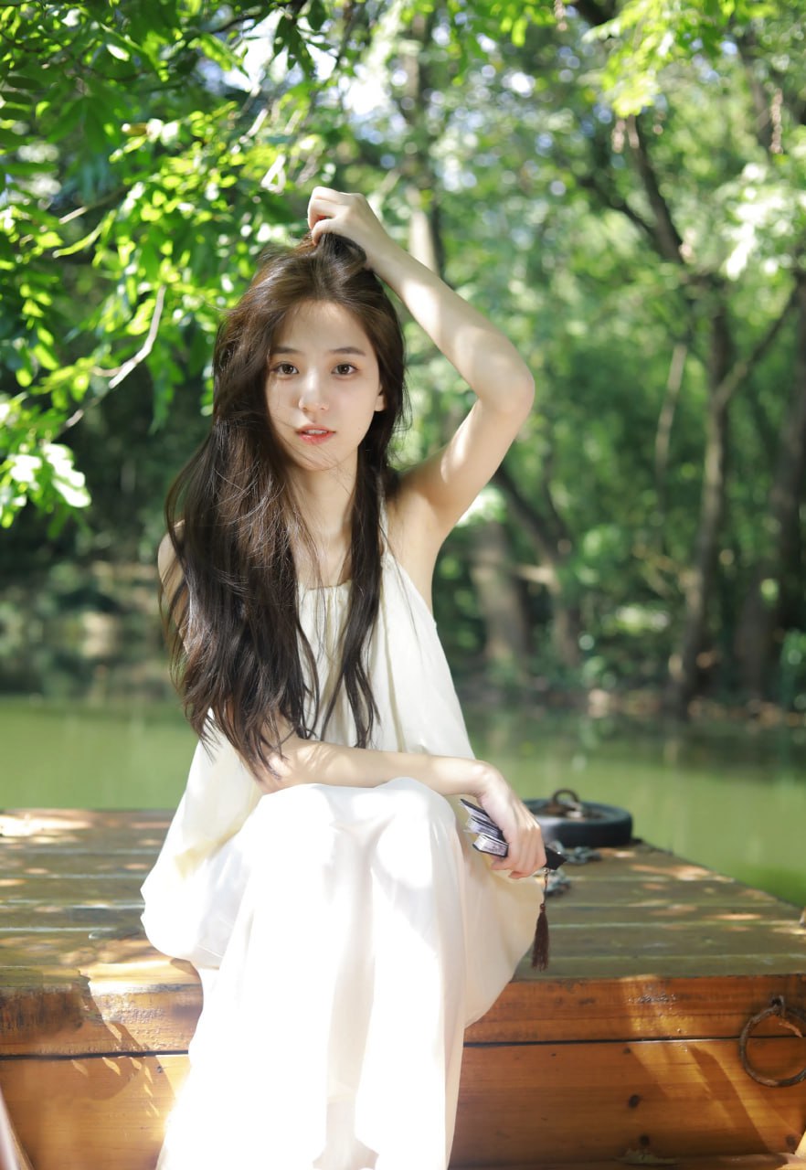 Stylish Asian woman in a traditional outfit