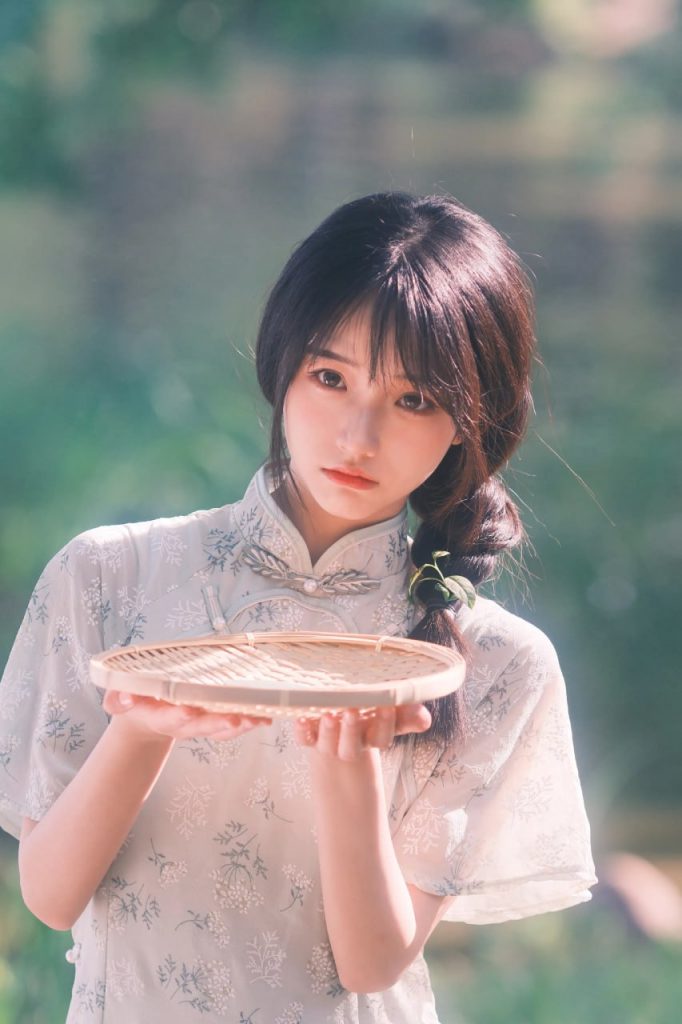 Vibrant photo of an Asian lady with a warm smile