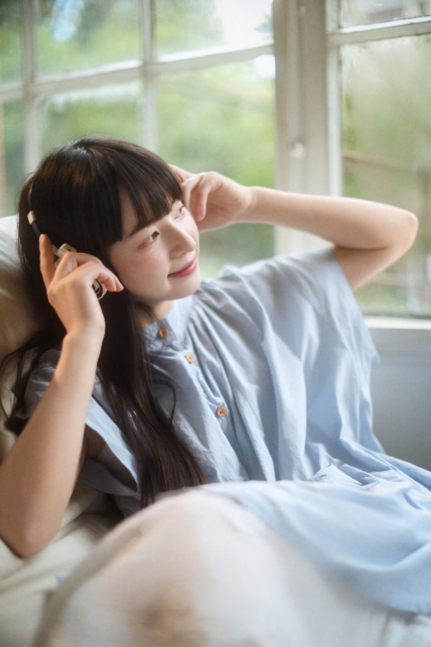 Elegant Asian lady in traditional dress smiling