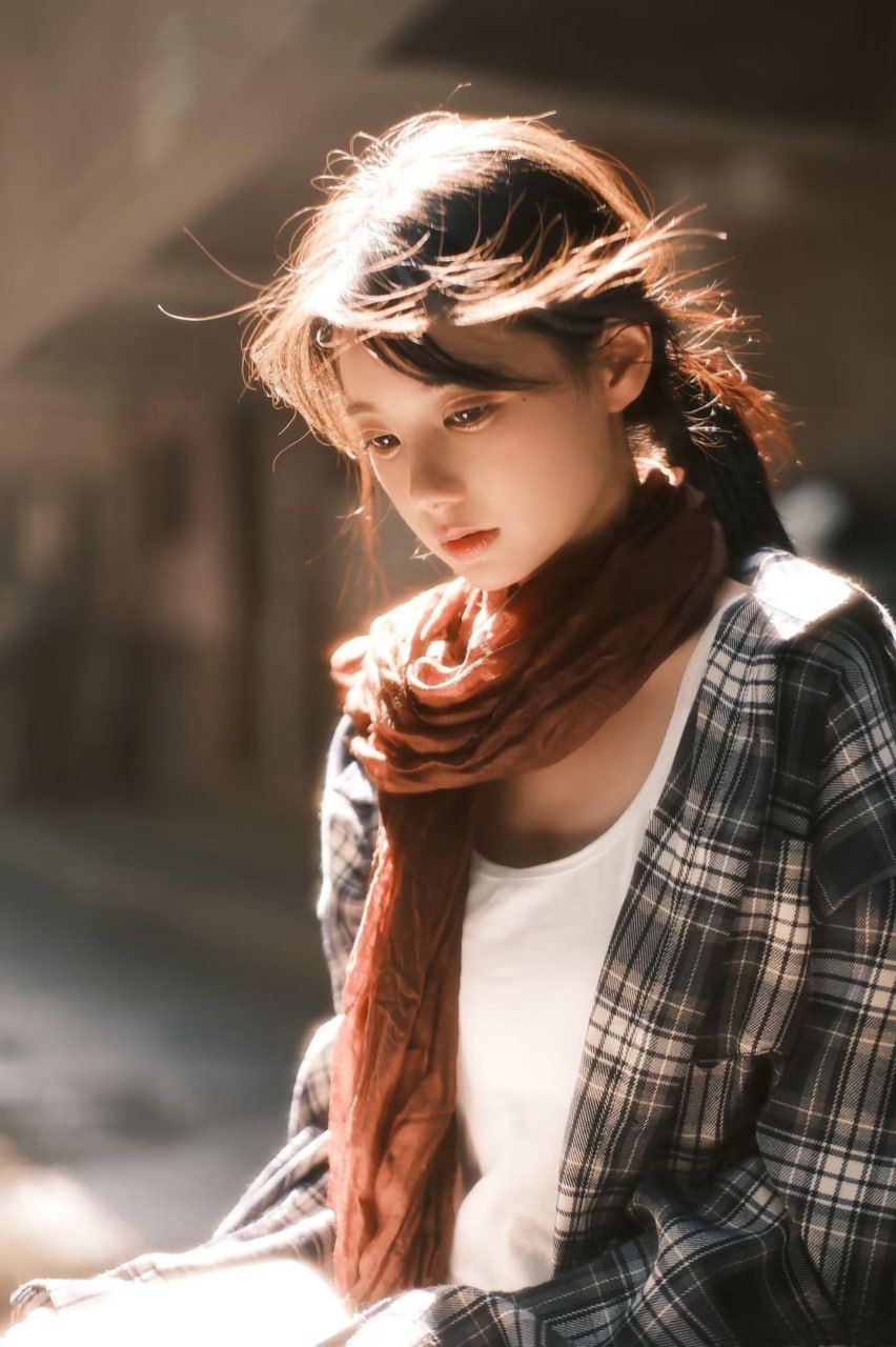Vibrant photo of an Asian lady with a warm smile