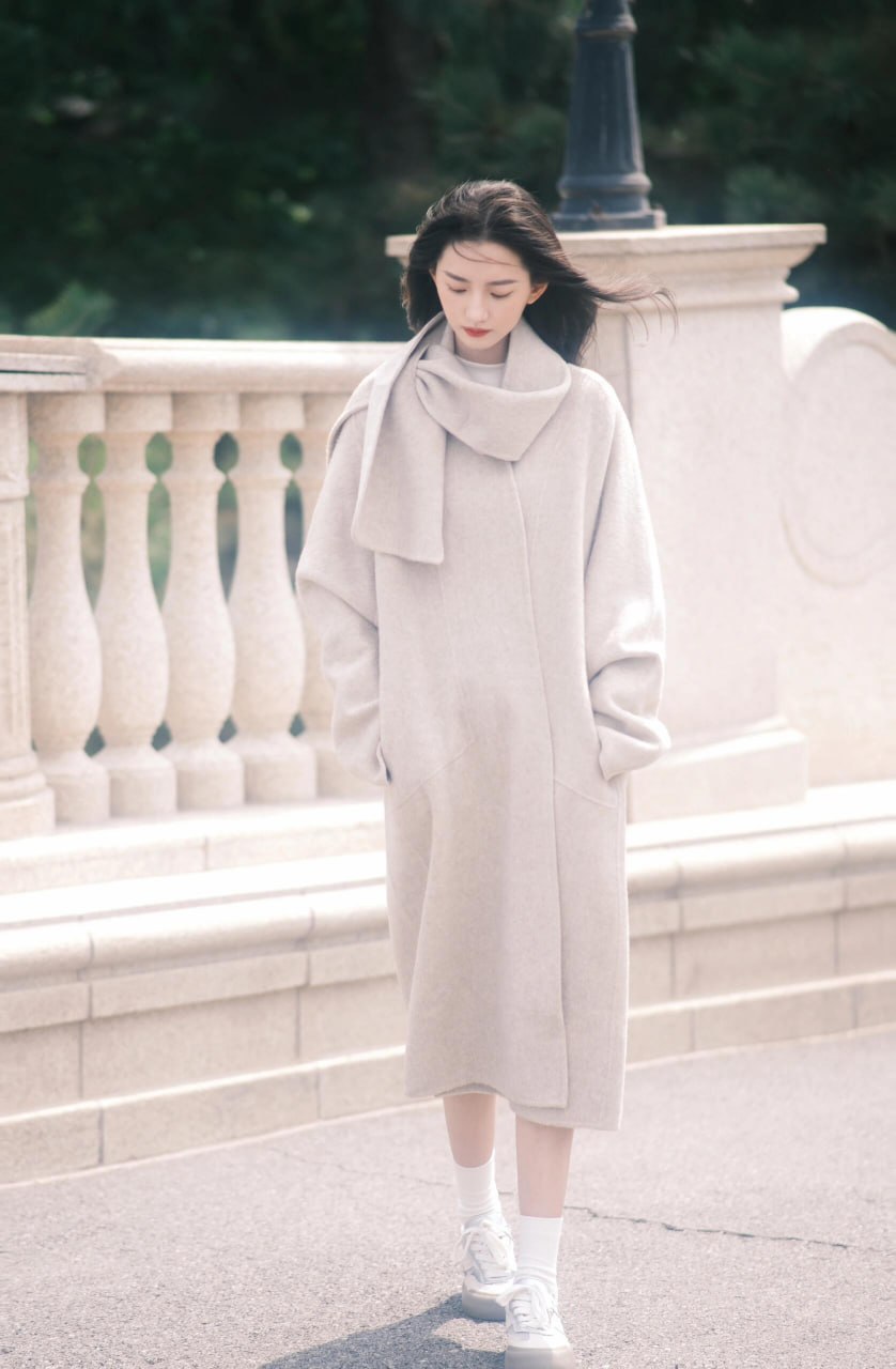 Elegant Asian woman framed by natural light